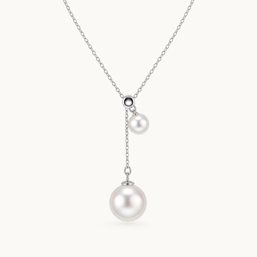 Round Starlight Japanese Akoya pearl pendant, silver-white pearls