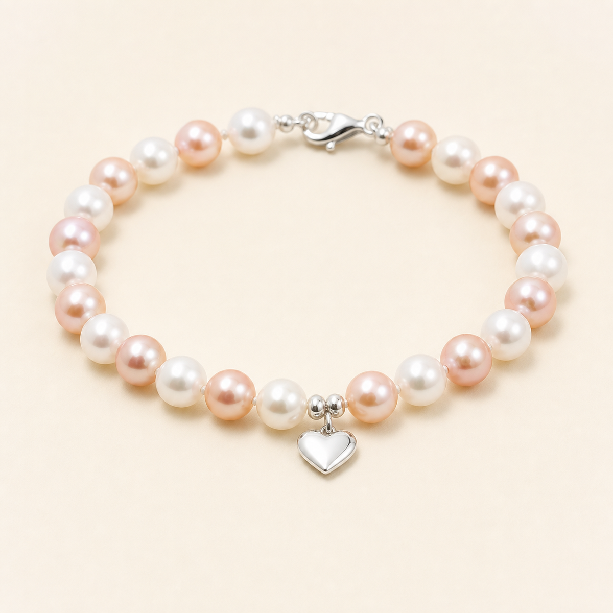 Amora 7-8mm white and rose freshwater pearl heart charm bracelet product view