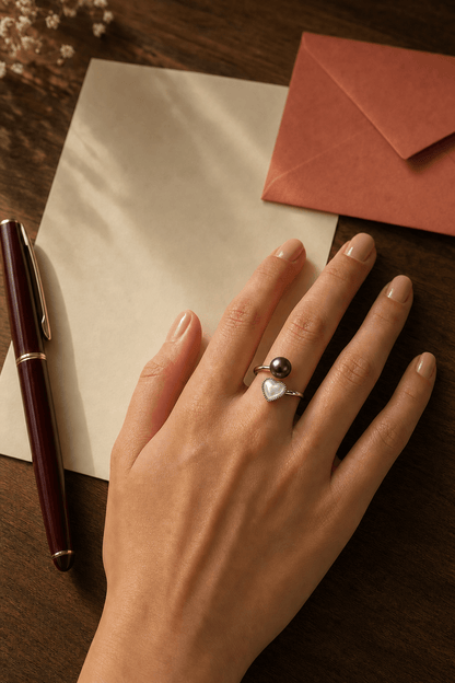 Amour Heart Mother-of-Pearl & Tahitian South Sea Pearl Open Ring worn in a lifestyle setting
