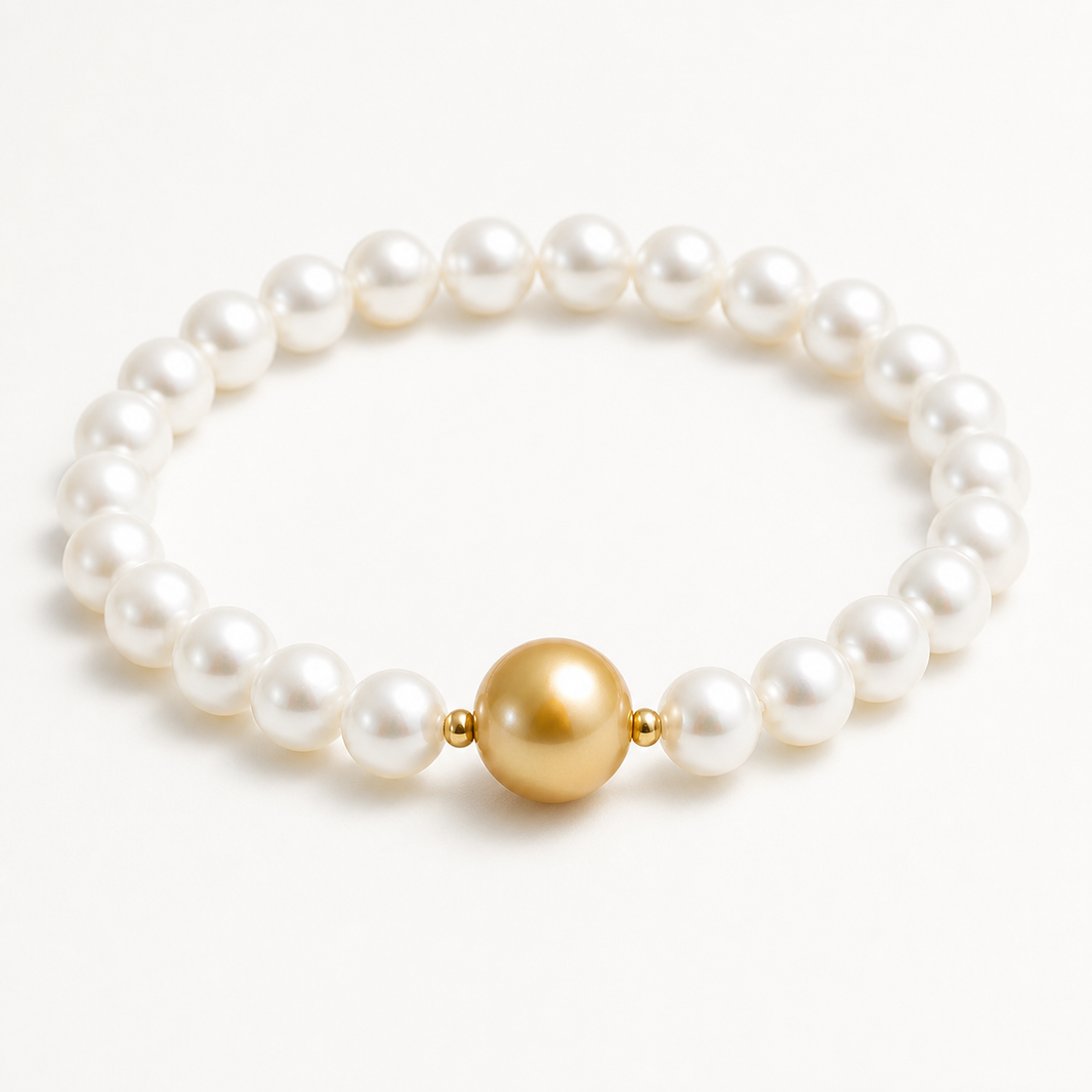 Aurora 6-11mm white and golden freshwater pearl stretch bracelet