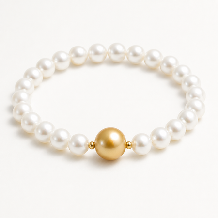 Aurora 6-11mm white and golden freshwater pearl stretch bracelet