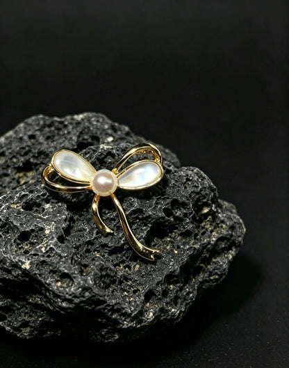Lucette white freshwater pearl mother-of-pearl bow brooch