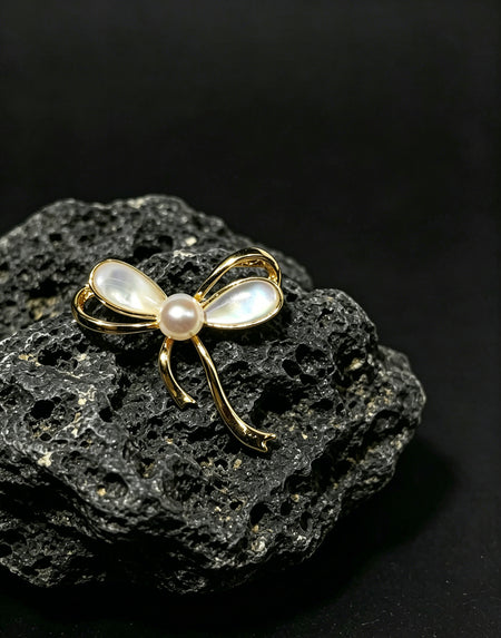 Lucette white freshwater pearl mother-of-pearl bow brooch