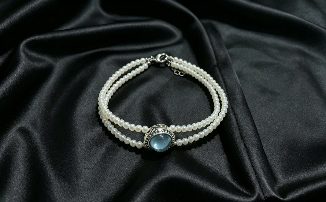 Lagoon white pearl triple-strand blue center bracelet product view