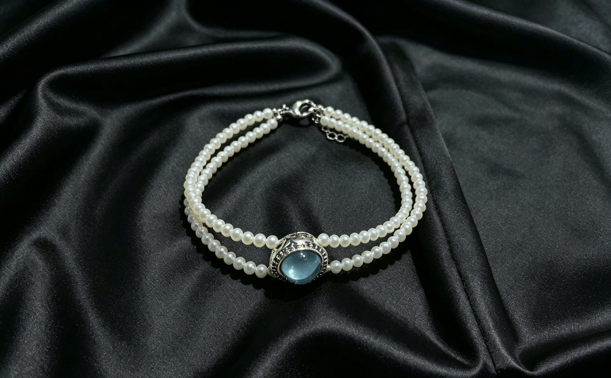 Lagoon white pearl triple-strand blue center bracelet product view