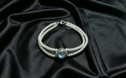 Lagoon white pearl triple-strand blue center bracelet product view