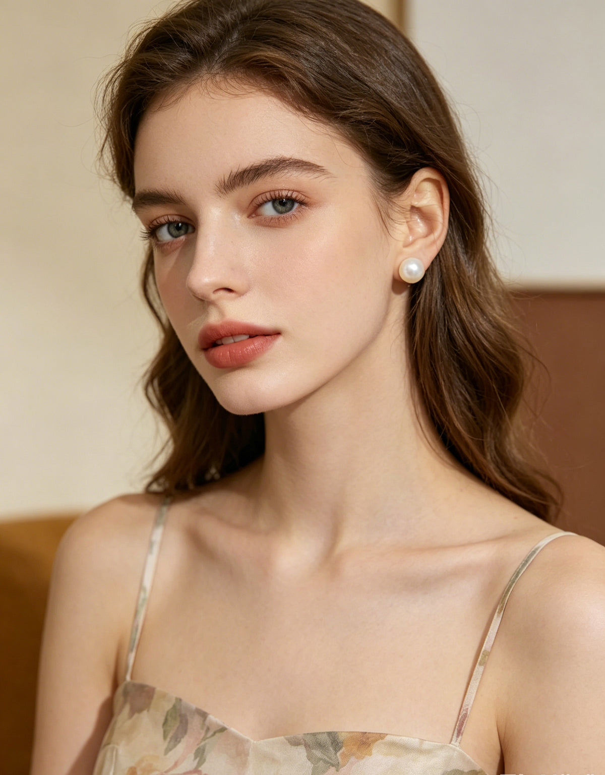 Bianca white pearl stud earrings in medium size on model