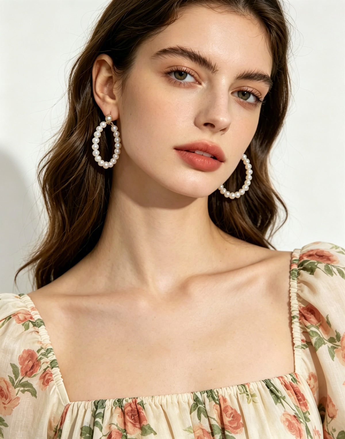 Arlette white pearl hoop earrings worn view