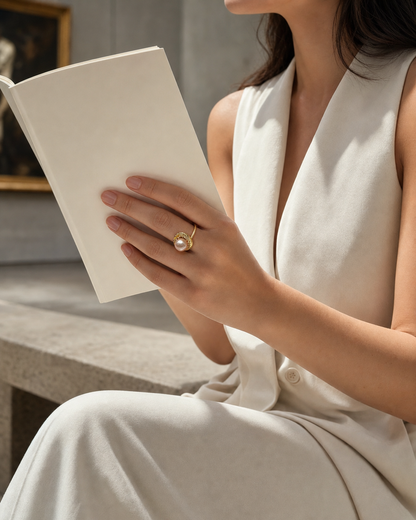 Lunette Freshwater Pearl Crescent Ring worn in a lifestyle setting