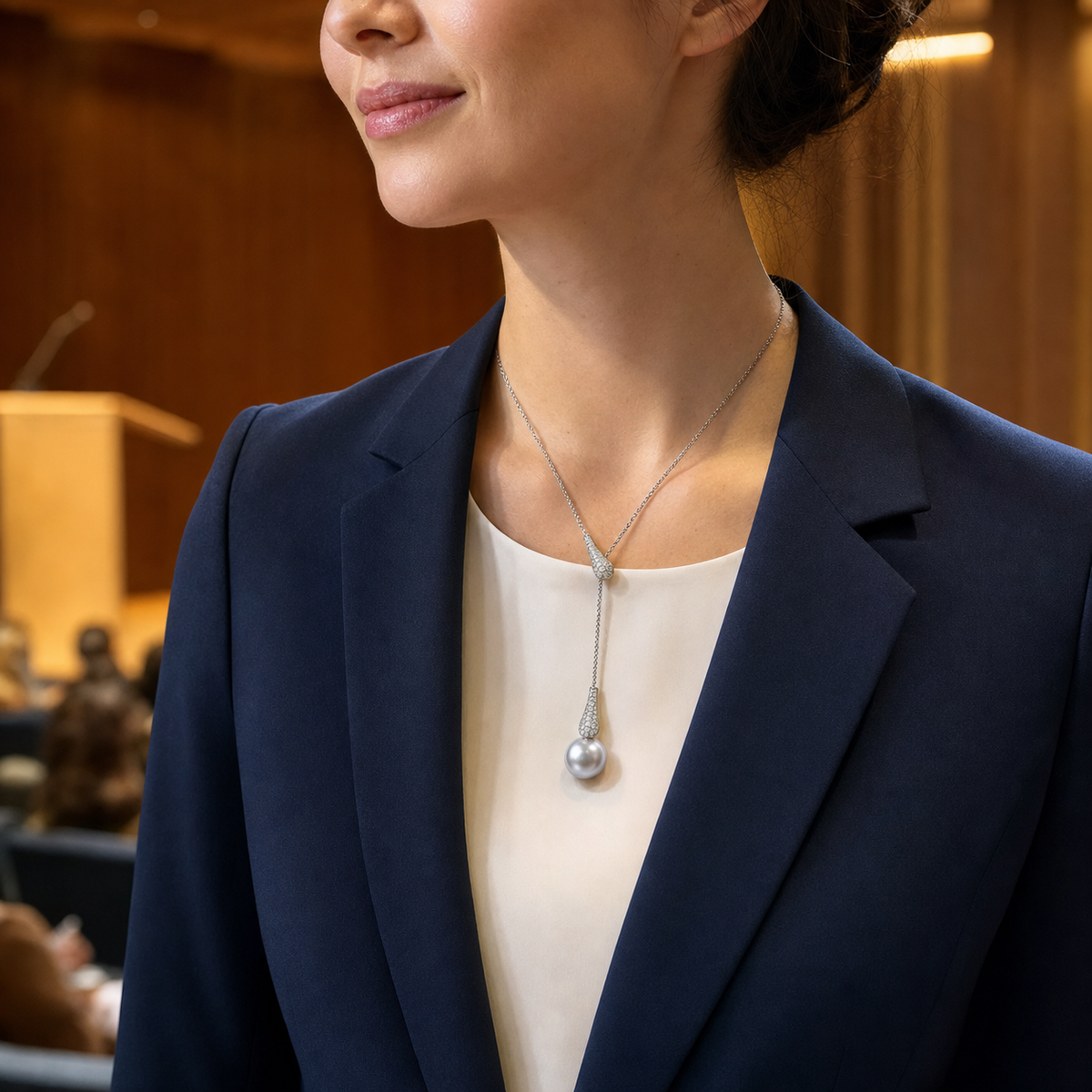 Mermaid Australian White South Sea pearl pendant worn before a cultural forum talk