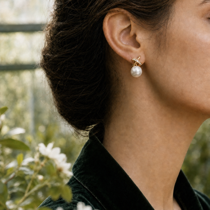 Ophelia Knot 9-10mm white Japanese Akoya pearl earrings on model