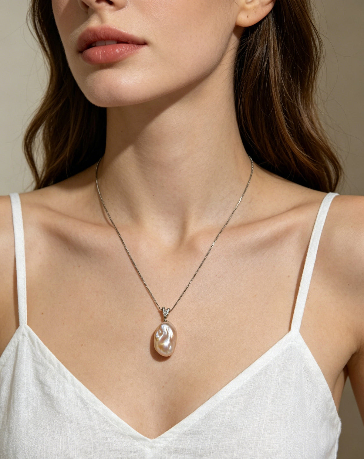 VARI Baroque supplemental image from opaline-25-35mm-white-baroque-freshwater-pearl-pendant 2