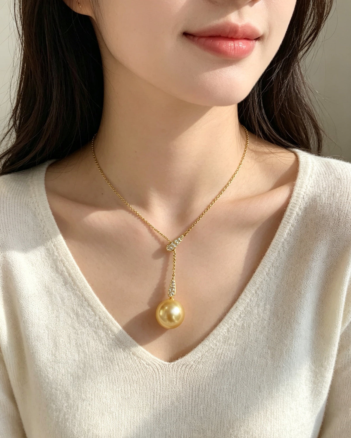 VARI Mermaid supplemental image from lorelei-11-12mm-golden-freshwater-pearl-lariat-pendant 3