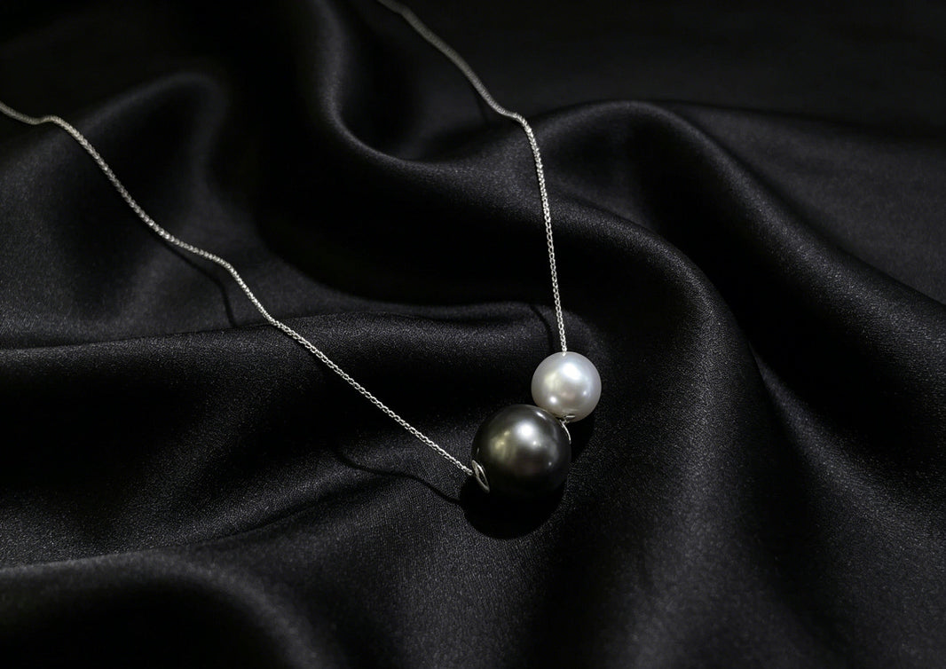 VARI Round Starlight supplemental image from nyx-12-16mm-white-black-double-freshwater-pearl-slider-pendant 1