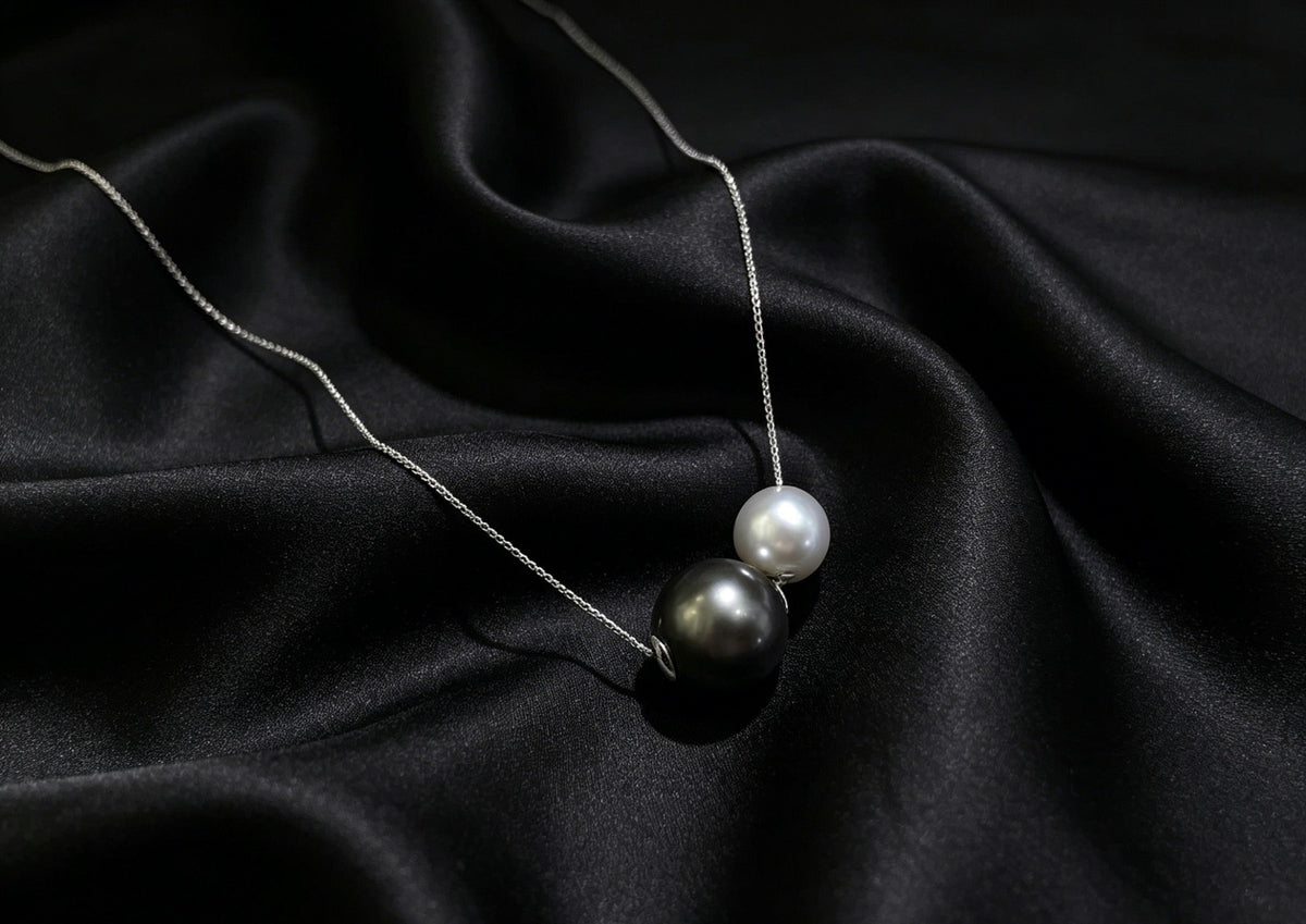 VARI Round Starlight supplemental image from nyx-12-16mm-white-black-double-freshwater-pearl-slider-pendant 1