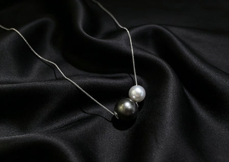 VARI Round Starlight supplemental image from nyx-12-16mm-white-black-double-freshwater-pearl-slider-pendant 1