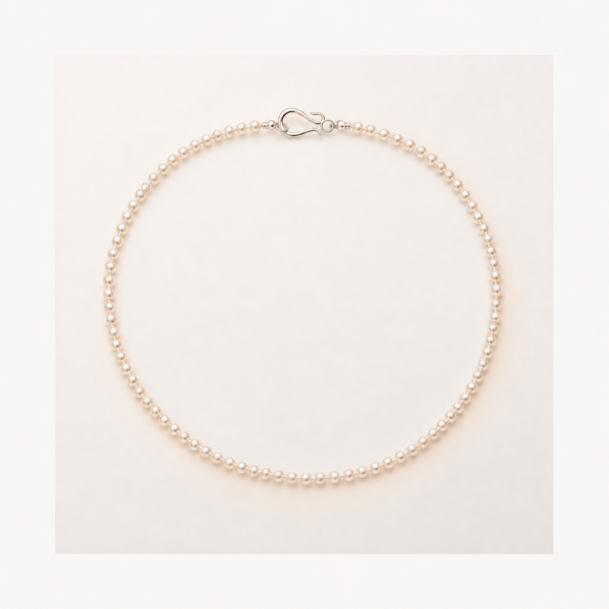 Seed Petite 3–4mm freshwater pearl necklace in Peach