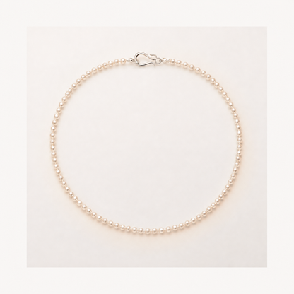 Seed Petite 3–4mm freshwater pearl necklace in Peach