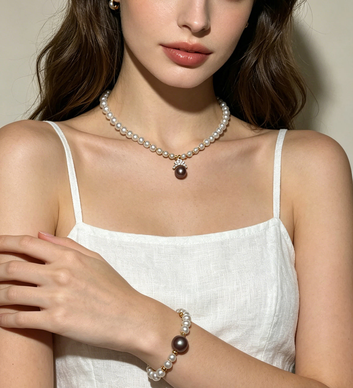 Nocturne dark pearl necklace and bracelet set worn