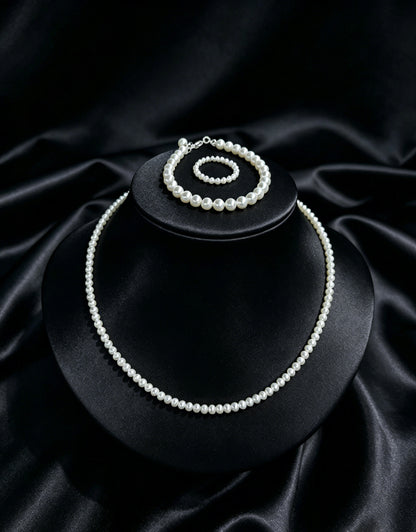 Essentials layered white freshwater pearl necklace and bracelet set
