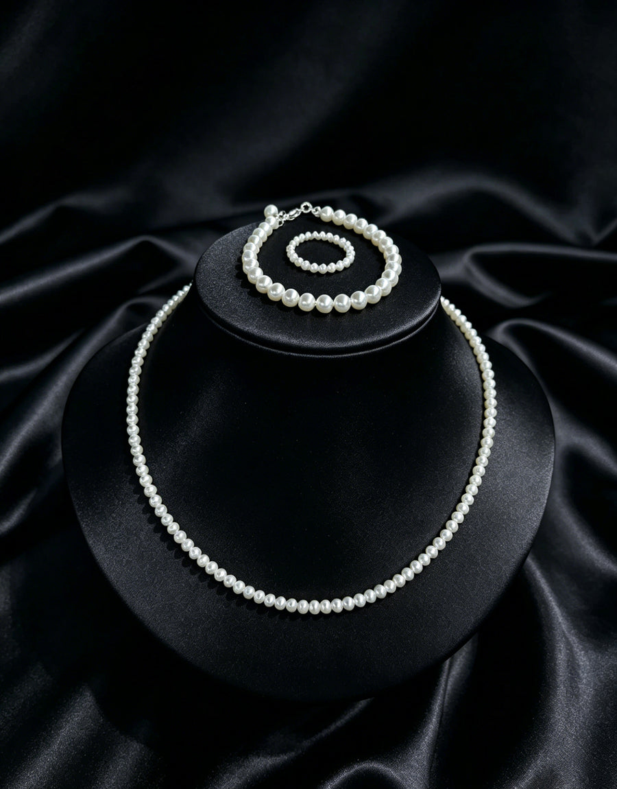 Essentials layered white freshwater pearl necklace and bracelet set