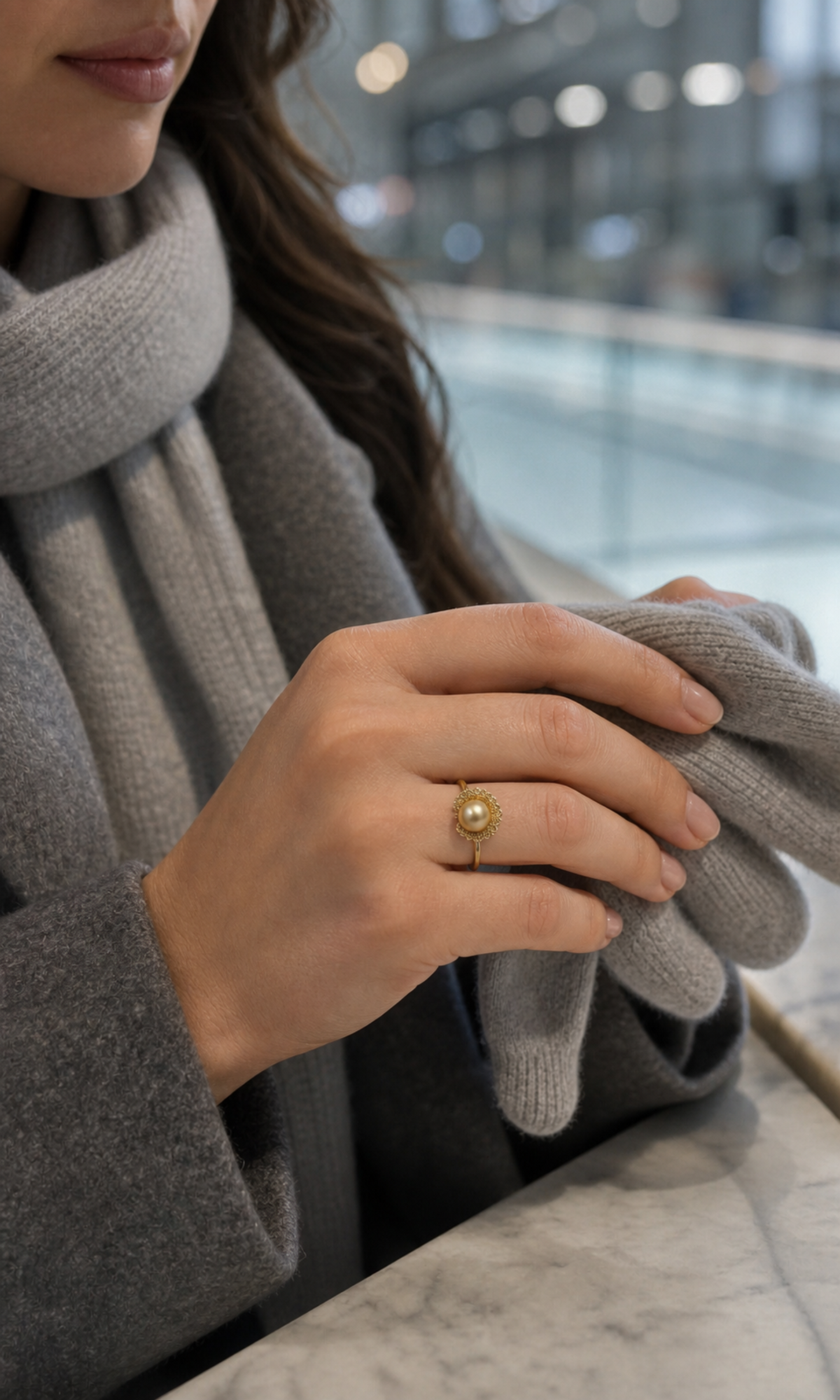 Solara Freshwater Pearl Lace Halo Ring worn in a lifestyle setting