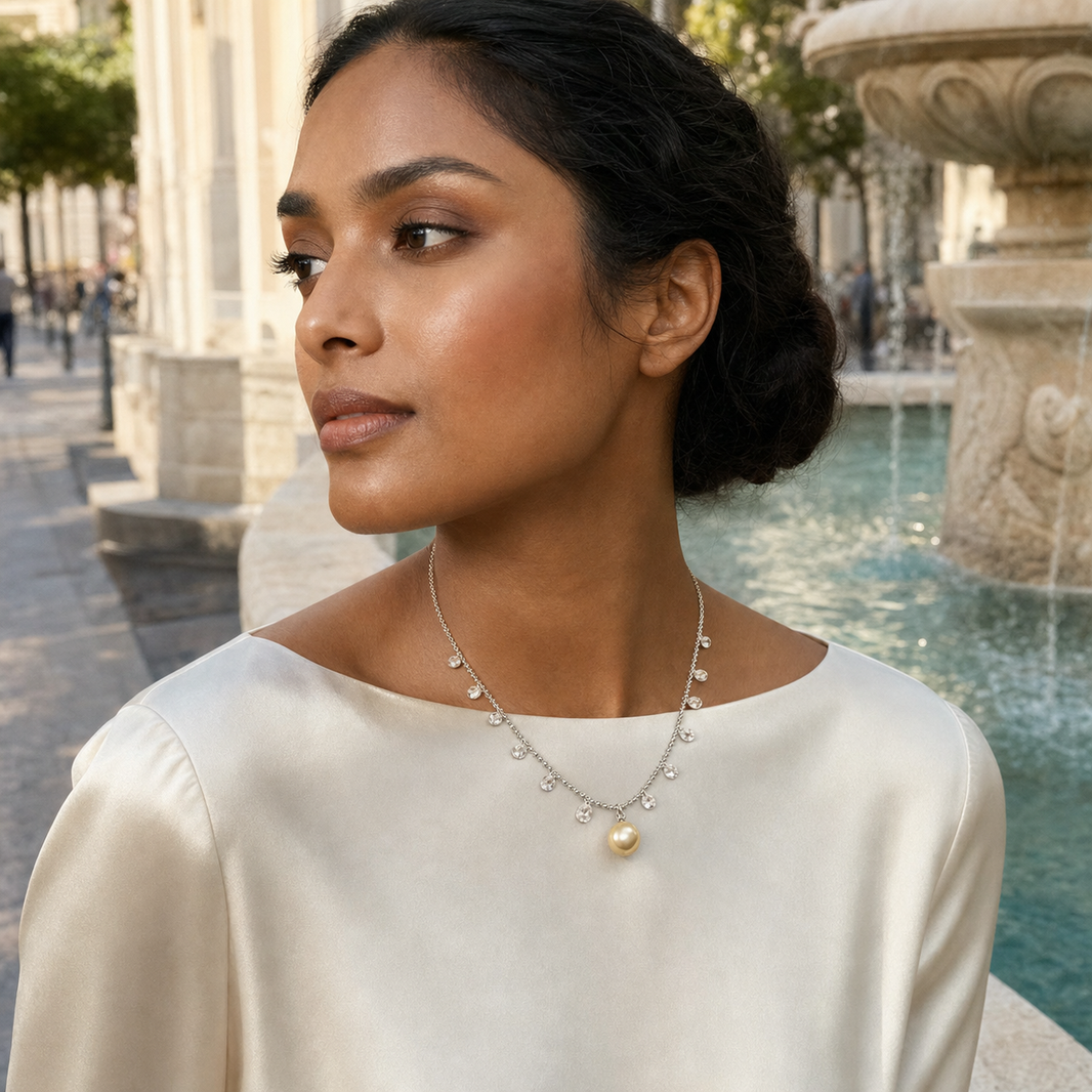 Model wearing Starlight Golden South Sea pearl cubic zirconia pendant necklace