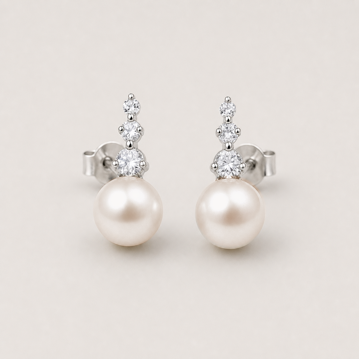 Trilogy 10-11mm peach freshwater pearl stud earrings