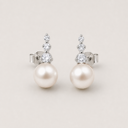 Trilogy 10-11mm peach freshwater pearl stud earrings