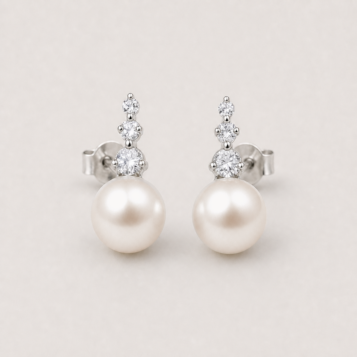Trilogy 11-12mm peach freshwater pearl stud earrings