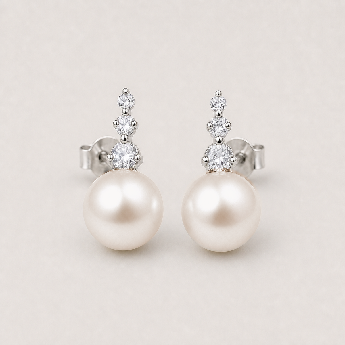 Trilogy 12-13mm peach freshwater pearl stud earrings