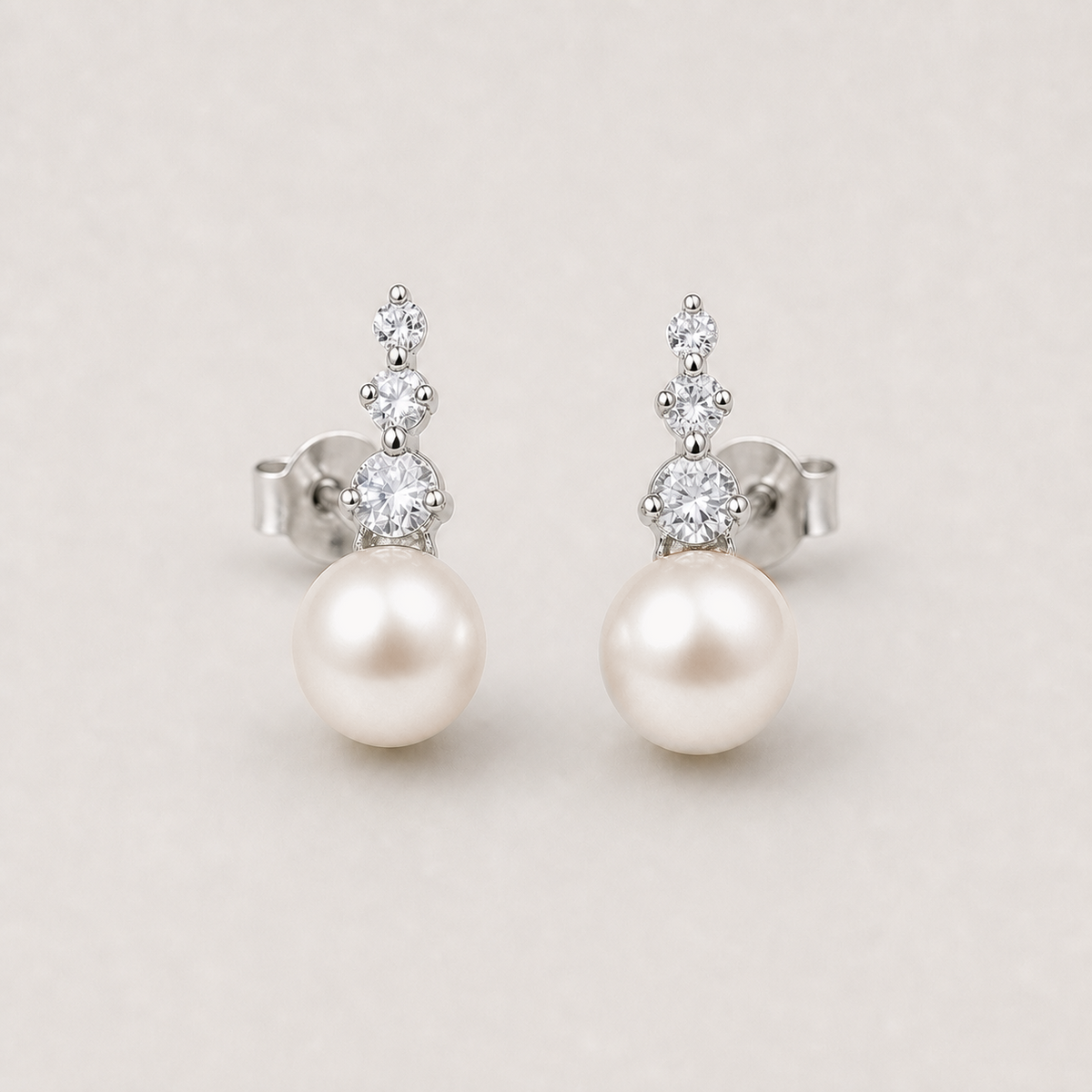 Trilogy 9-10mm peach freshwater pearl stud earrings