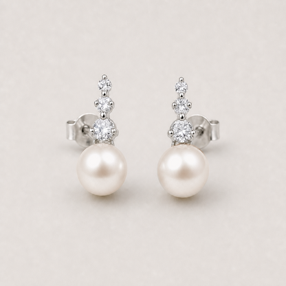 Trilogy 9-10mm peach freshwater pearl stud earrings